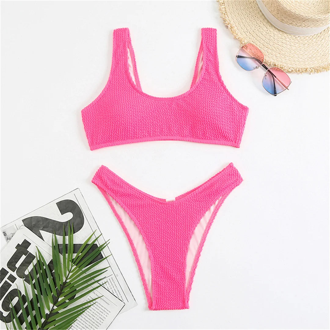 High cut bikini set in eight colors with wrinkled crinkled texture and solid design for a chic and flattering fit.