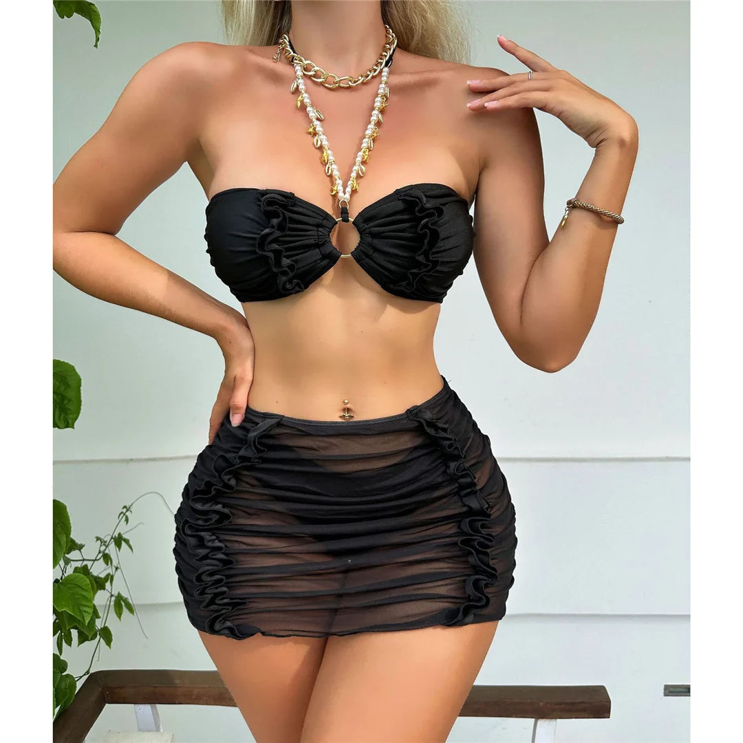 Chic pearl wrinkled halter bikini with skirt in solid black, featuring a three-piece design, wire-free support, and comfortable fit, made of nylon and spandex, perfect for women's beach and pool outings