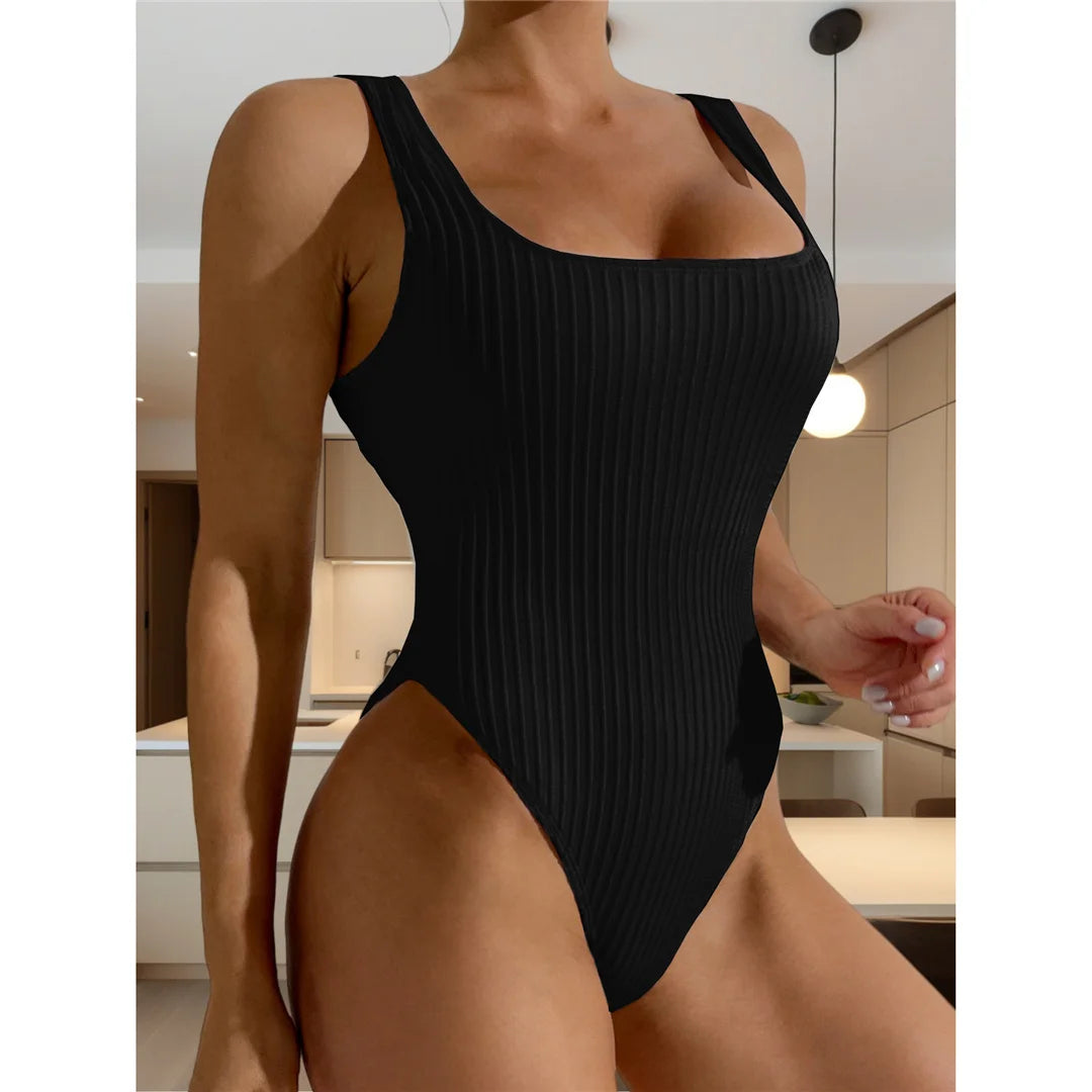 Ribbed cut-out backless one-piece swimsuit, strappy high-leg design, adjustable triangle top, monochrome solid pattern, polyester spandex blend, women&#39;s daring and elegant swimwear.