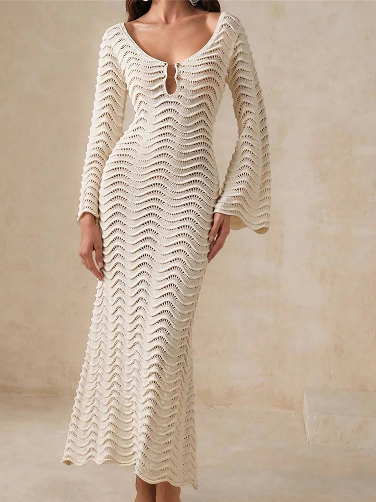 Long sleeve backless crochet knitted tunic with wrinkled pattern in solid colors for a chic beach cover-up.