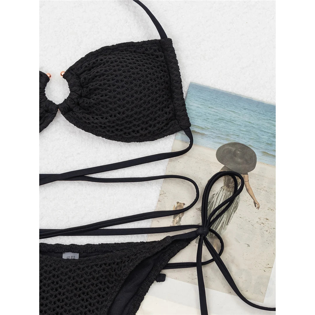 Wrap-around halter high-cut leg bikini set with solid pattern for a chic and comfortable swimwear option for women.