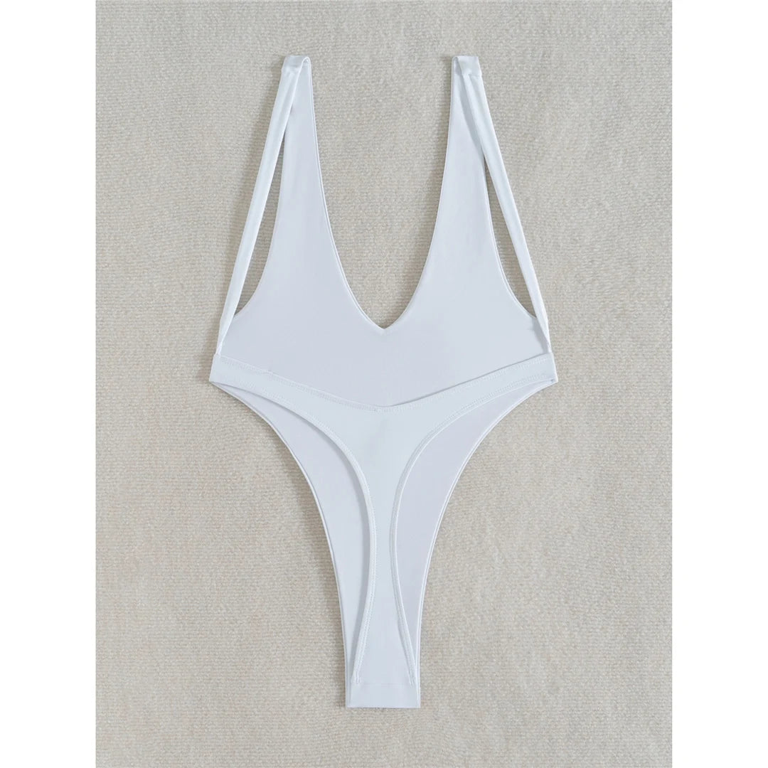 Deep V neck one piece swimsuit in solid white with mini micro thong, high cut design, and adjustable straps for women.