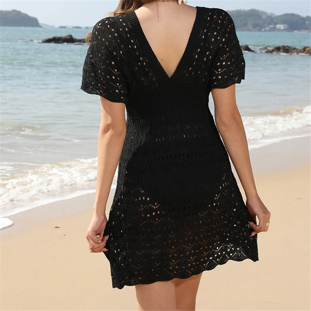 Bohemian Style Short Sleeve Crochet Tunic Beach Cover Up, Features a V-neck Design. Carefully Knitted from Materials including Nylon, Polyester, Rayon, and Cotton. Available in Women&#39;s Sizes S, M, L, XL, Fits True to Size. Comes in Colors Khaki, Black, White, and Multicolor. Ideal for Women Aged 18-35 and Adults, In Stock, New Condition, Free Shipping Available.