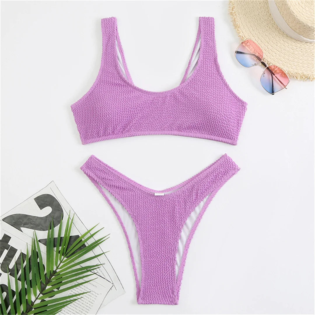High cut bikini set in eight colors with wrinkled crinkled texture and solid design for a chic and flattering fit.