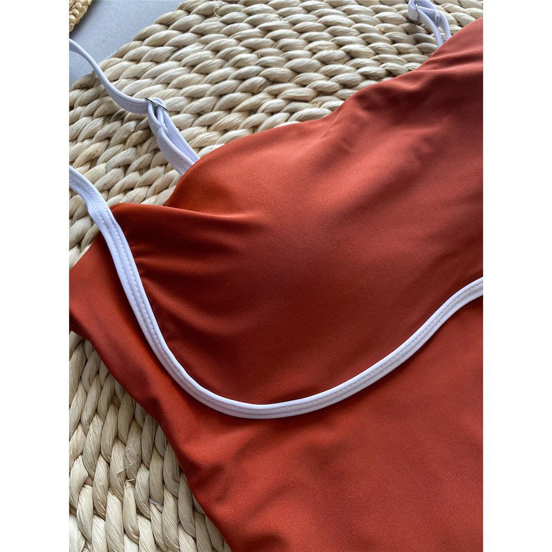 Elegant Splicing High Leg Cut One-Piece Monokini in Brown, Made of Nylon and Spandex with Patchwork Pattern, Includes Pad for Support, Ideal for Women, Available in Sizes S to L, Combines Timeless Style and Modernity