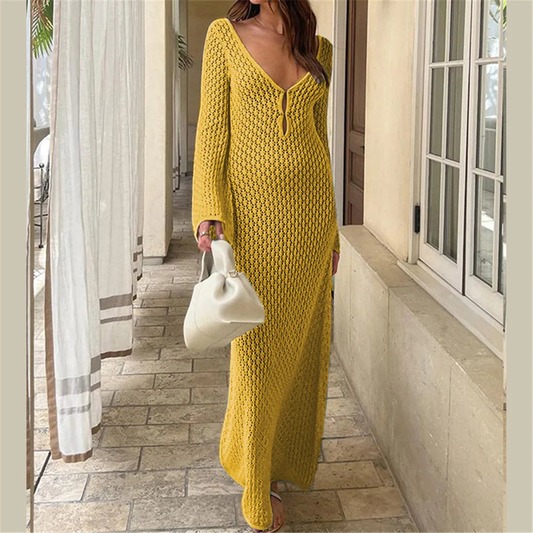 Bohemian-style long sleeve crochet tunic perfect for beach cover-up. This V-neck tunic is available in five colors - Coffee, White, Light Blue, Black, and Yellow. Made from nylon, polyester, rayon, and cotton, its knitted design provides coverage and breathability. Fits true to size and is the perfect companion for any swimwear ensemble.