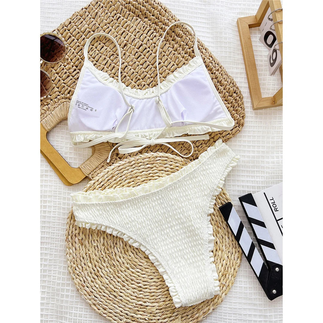 Frilled Ruffled Mid Waist Bikini set with charming frills and ruffles, Polyester Spandex material, solid pattern, wire-free, mid waist design, offers a unique and stylish twist for women.