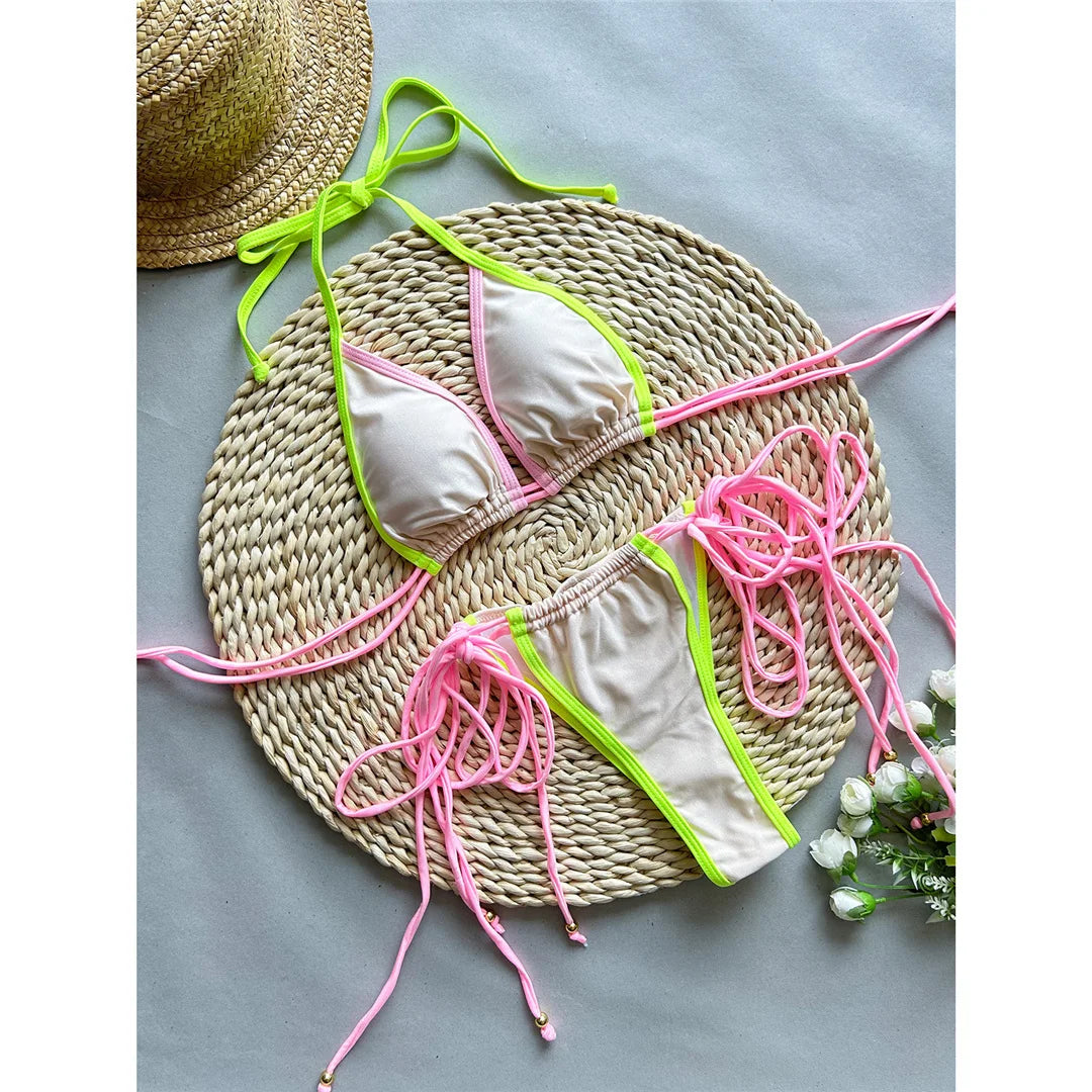 Splicing halter bikini with strappy details and scrunch butt design, featuring patchwork pattern and wire-free support, low waist fit, made from polyester and spandex for women. Available in colors: Sky Blue, Beige.