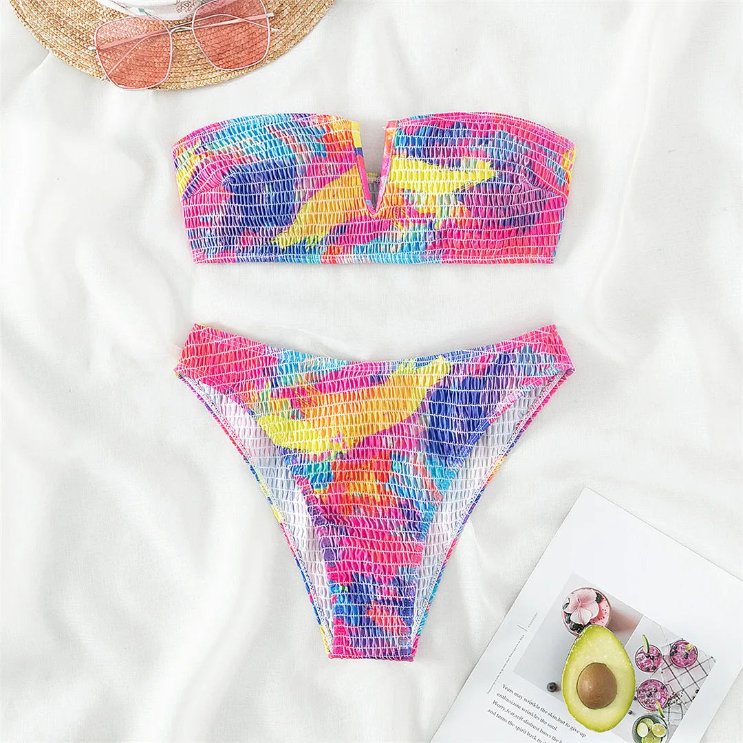 Experience Summer Chic with Our Printed Bandeau Bikini Set in Multicolor, Featuring a Stylish Wrinkled Texture and V-Shaped Bottom. Made from Nylon and Spandex, Offers a Sleek, Strapless Look. Ideal for Middle Aged Women. Fits True to Size and Comes with Padding for Extra Comfort. Brand New and in Stock.