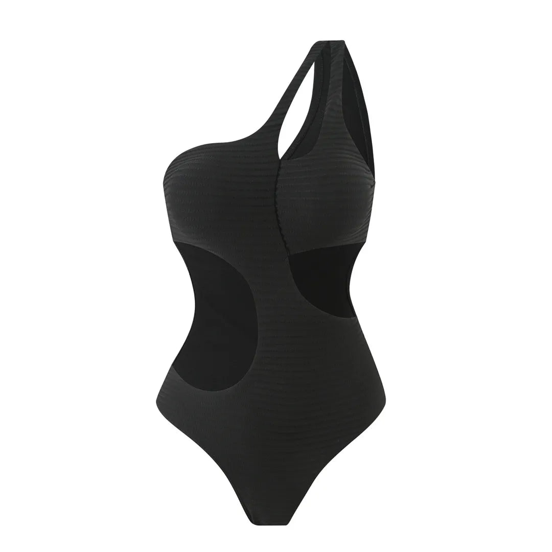 Embrace unique style with a cut out asymmetric one shoulder one piece swimsuit, offering elegance and boldness through its high leg cut design. Featuring strategic cut outs, a padded fit, and adjustable shoulder strap for maximum comfort and support. Made from polyester, spandex, and polyamide, this monochrome solid pattern is ideal for those making a fashion statement on the beach or poolside. Available in black and white.