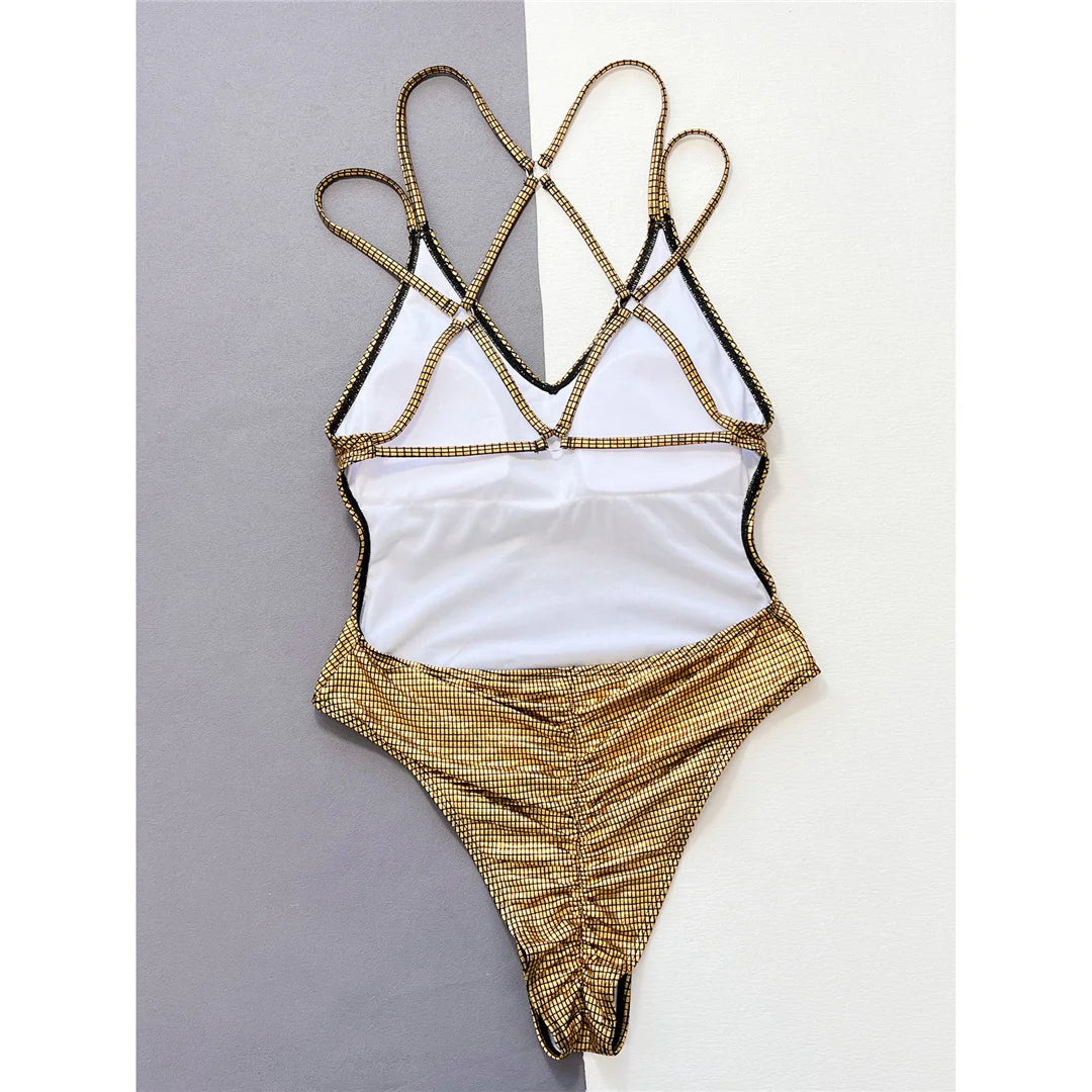 Women's Plaid V-Neck Cross Back One Piece Swimsuit in Gold. Made from Nylon and Spandex, Features a High Leg Cut, Scrunch Butt Detailing, and Wire Free Support. This Swimwear Fits True to Size, Perfect for Beach or Pool Day. Available in Sizes S, M, L.