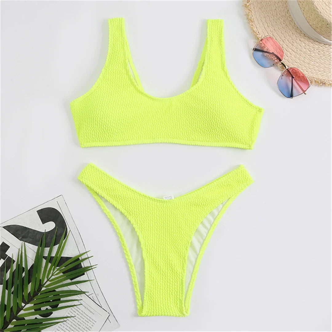 High cut bikini set in eight colors with wrinkled crinkled texture and solid design for a chic and flattering fit.