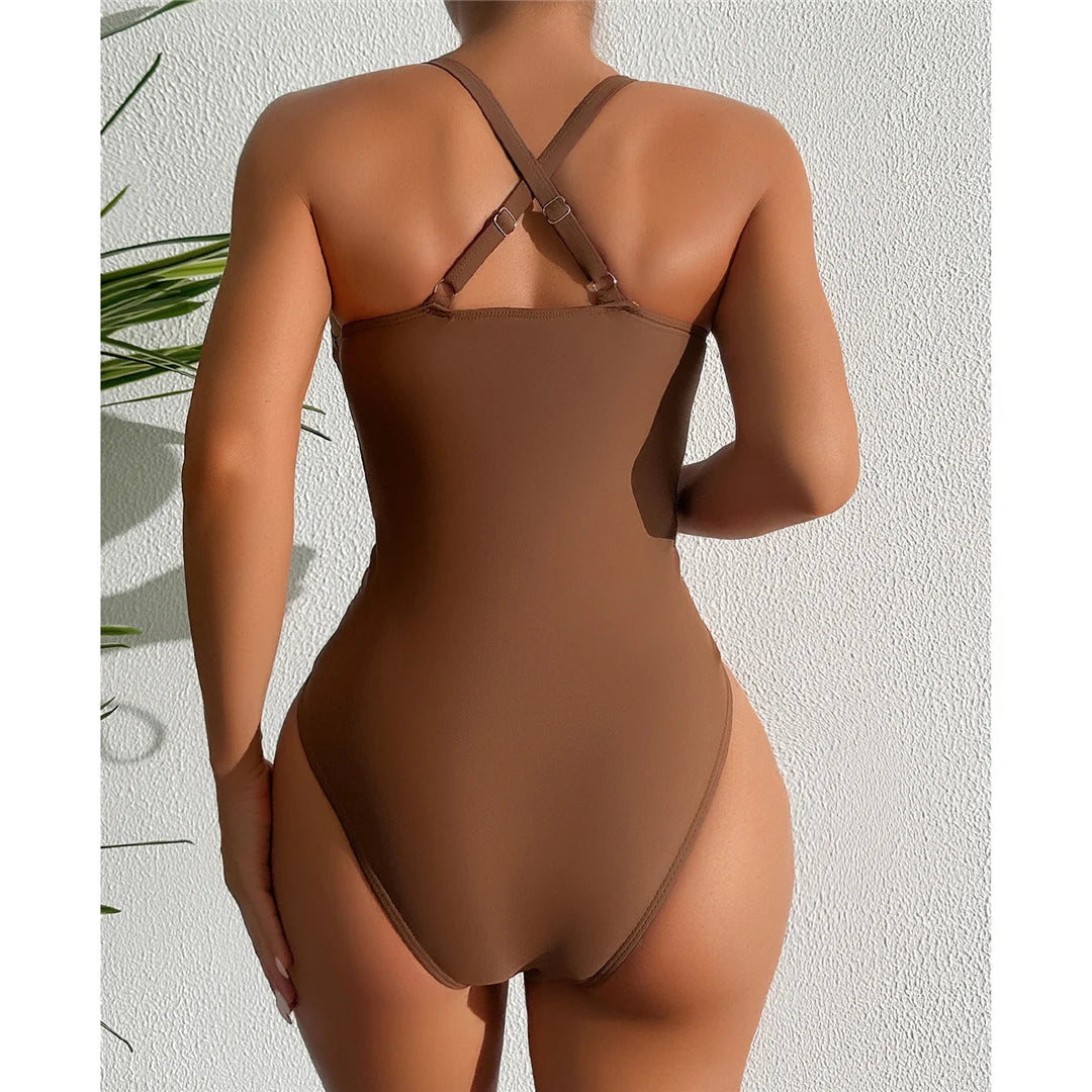 V neck lace-up cross back one piece swimsuit with wrinkled texture and high cut design in solid dark brown.