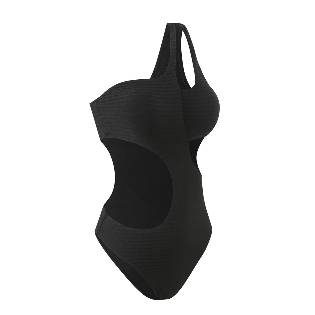 Embrace unique style with a cut out asymmetric one shoulder one piece swimsuit, offering elegance and boldness through its high leg cut design. Featuring strategic cut outs, a padded fit, and adjustable shoulder strap for maximum comfort and support. Made from polyester, spandex, and polyamide, this monochrome solid pattern is ideal for those making a fashion statement on the beach or poolside. Available in black and white.