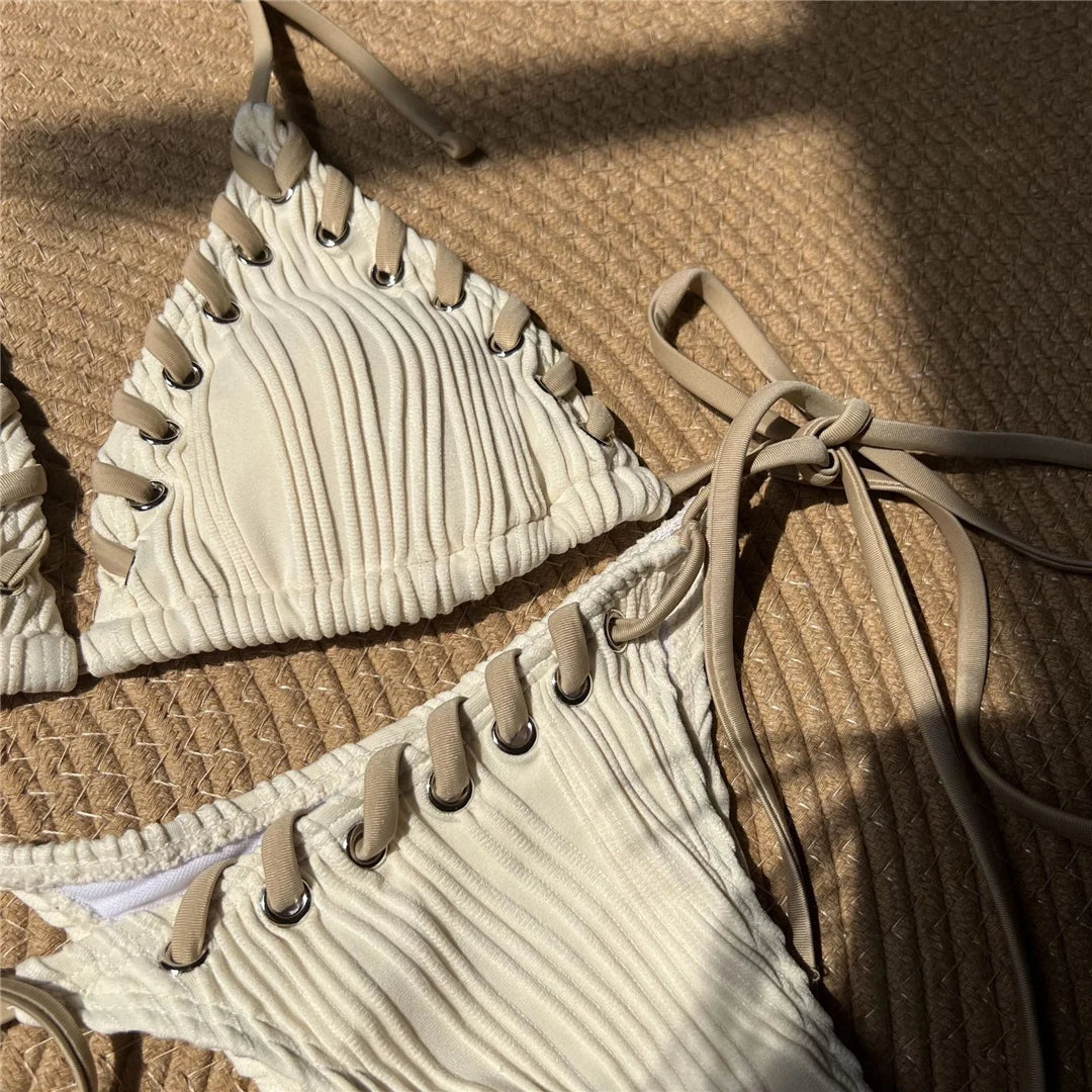 Dive into style with a stunning halter strappy high leg cut two-piece bikini set in vibrant colors. Perfectly designed to accentuate curves, featuring a solid pattern with comfortable halter straps for a perfect sun-ready fit. Made from polyester and spandex, this wire-free, low waist women&#39;s bikini includes a knit-crafted fabric and supportive pads.