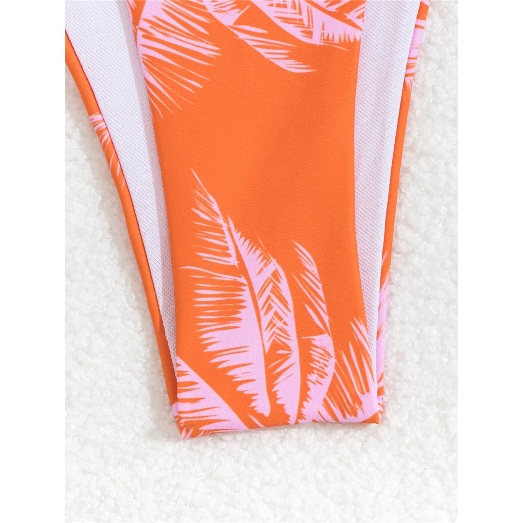 Printed high-leg padded bikini set, polyester spandex blend, wire-free support, low waist, women's two-piece swimwear, eye-catching design for beach or pool.